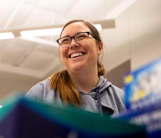 A woman smiling
