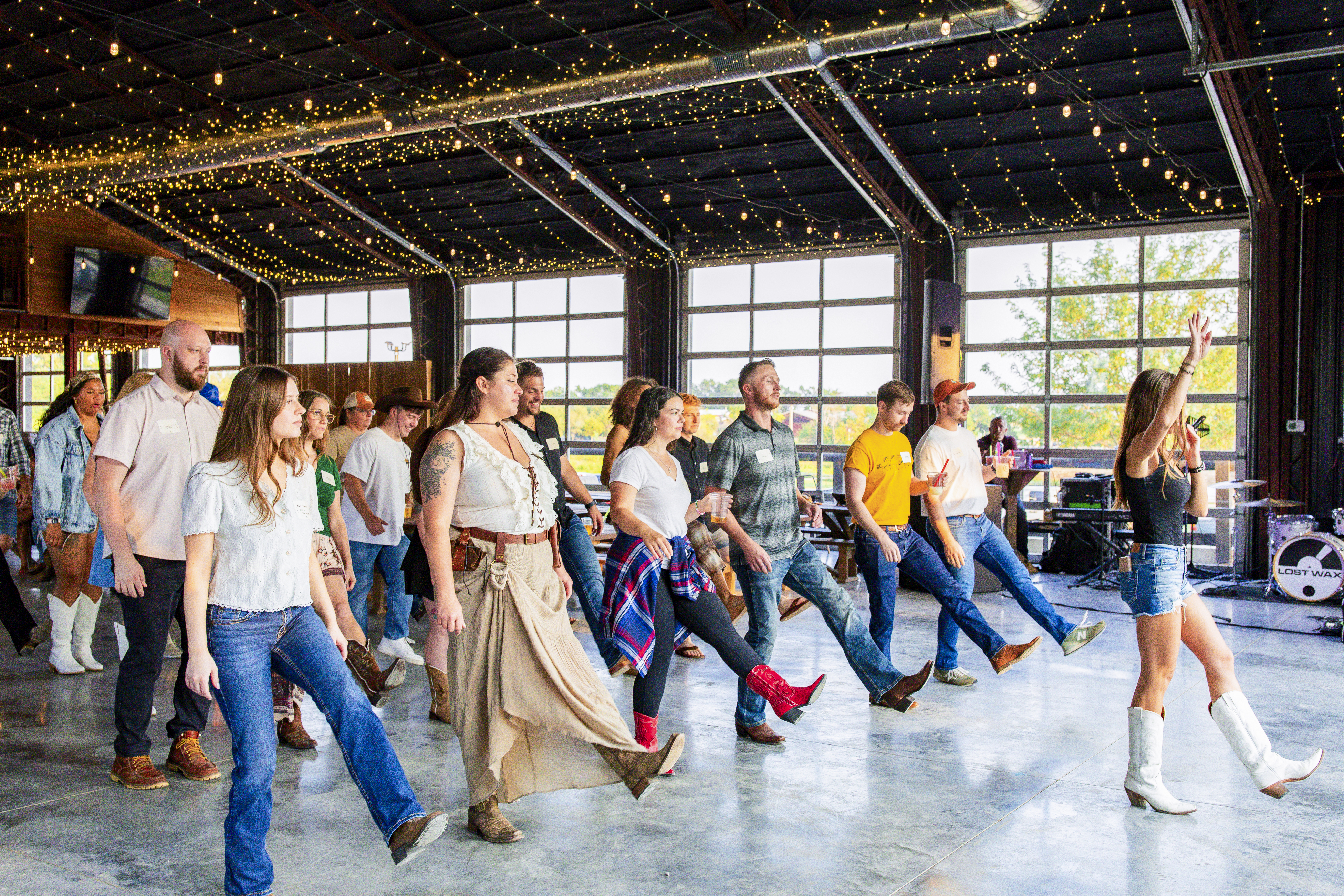 group of people line dancing