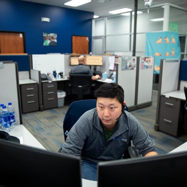 Employees working at their machines