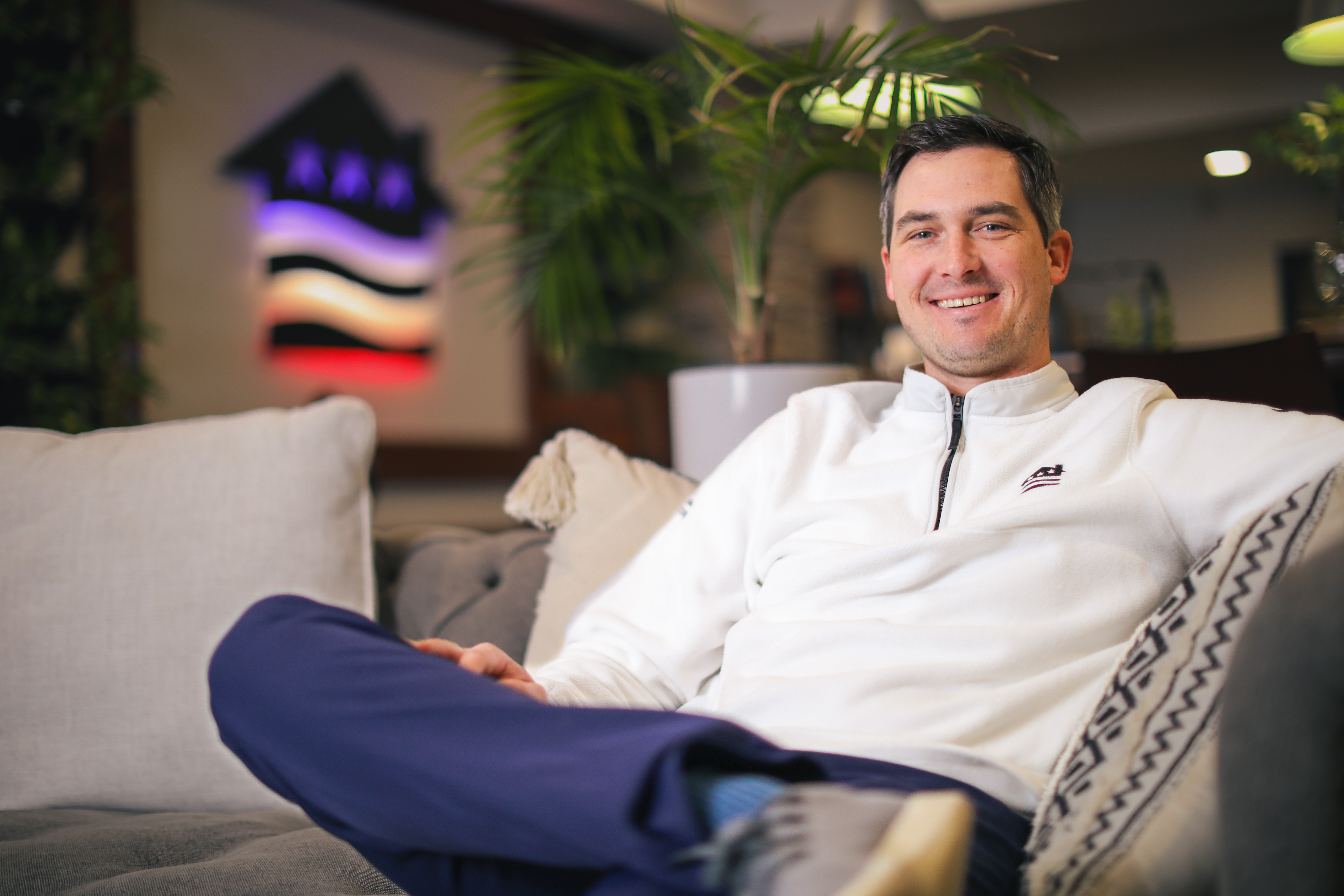 A man sitting on a couch