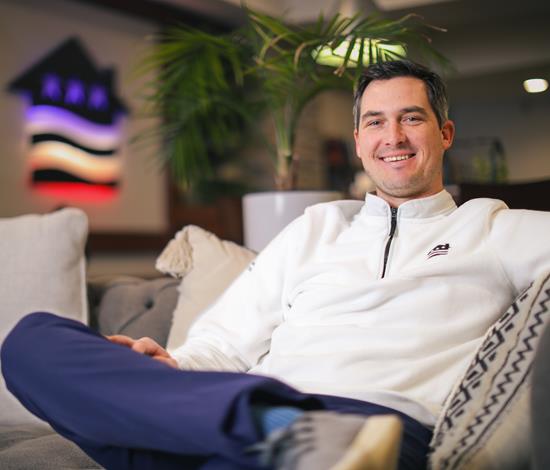 A man sitting on a couch