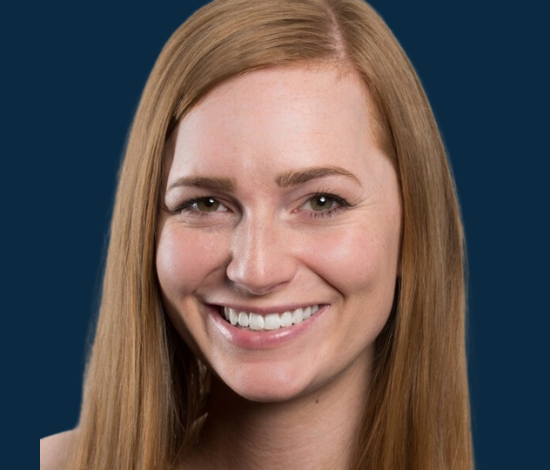 A smiling woman with long hair